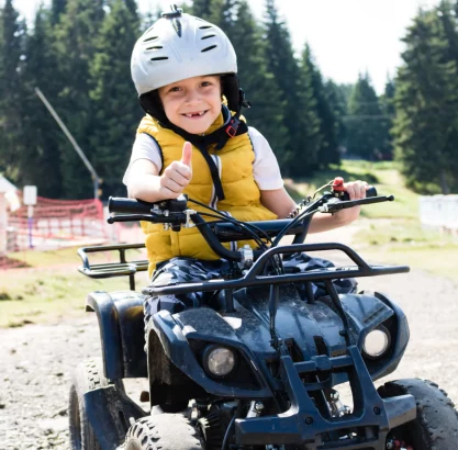 boy-riding-motorcycle-min